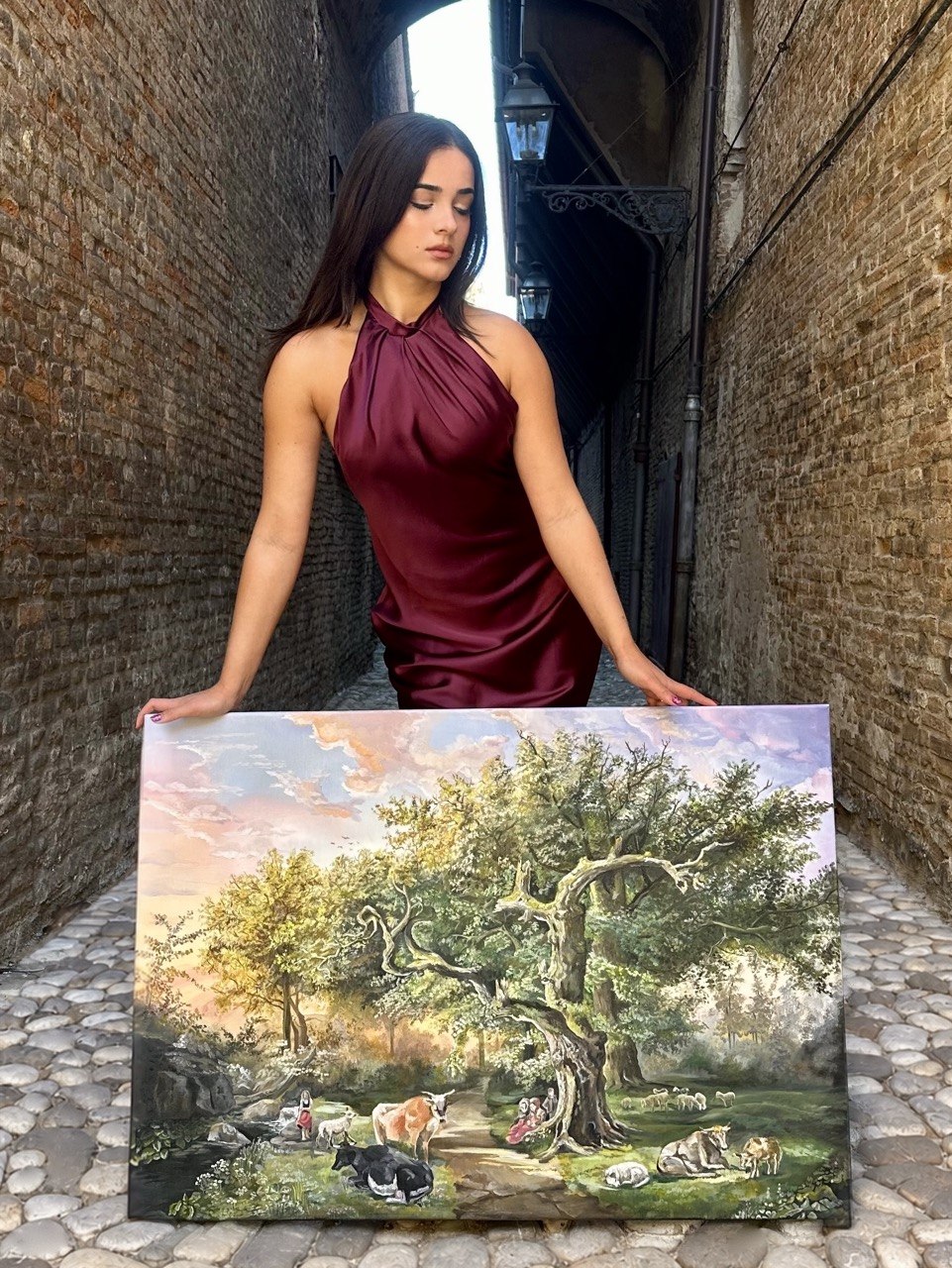 Sonya Askerova with her painting Medieval Forest